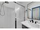 Updated shower featuring tile surround, glass doors and modern fixture at 1951 Raspberry Hill Rd, Las Vegas, NV 89142