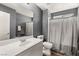 Bathroom featuring a vanity, mirror, and shower at 232 Dog Leg Dr, Las Vegas, NV 89148