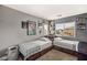 This bedroom features two beds and natural light at 232 Dog Leg Dr, Las Vegas, NV 89148