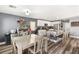 Open-concept dining area seamlessly connects to the kitchen and living spaces at 232 Dog Leg Dr, Las Vegas, NV 89148