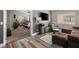 Comfortable living room with a view into the bedroom, perfect for relaxation and entertainment at 232 Dog Leg Dr, Las Vegas, NV 89148