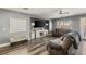Bright living room with wood flooring and ample natural light at 232 Dog Leg Dr, Las Vegas, NV 89148