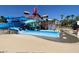 Community water park featuring thrilling slides and recreational water features on a sunny day at 232 Dog Leg Dr, Las Vegas, NV 89148