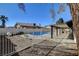 Fenced backyard with pool and covered patio at 2381 Marion St, Las Vegas, NV 89104