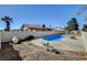 Fenced backyard with pool, patio, and landscaping at 2381 Marion St, Las Vegas, NV 89104