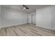 Bedroom with wood-look floors and ceiling fan at 2381 Marion St, Las Vegas, NV 89104