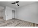 Bright bedroom features wood floors, recessed lighting, ceiling fan and a closet for added storage space at 2381 Marion St, Las Vegas, NV 89104