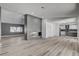 Bright living room with fireplace, neutral tones, and wood flooring at 2381 Marion St, Las Vegas, NV 89104