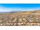 A wide view of the property and surrounding neighborhood near the mountains at 2612 Tullamore Creek Ln, Laughlin, NV 89029