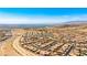 A panoramic view of a neighborhood with mountain backdrop at 2612 Tullamore Creek Ln, Laughlin, NV 89029