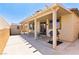 Large covered patio with space for grilling and outdoor enjoyment at 2612 Tullamore Creek Ln, Laughlin, NV 89029