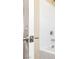 Bright white shower with chrome fixtures and a crisp, clean door handle at 2612 Tullamore Creek Ln, Laughlin, NV 89029