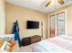Comfortable bedroom with natural light, a ceiling fan, and plenty of space for relaxation at 2612 Tullamore Creek Ln, Laughlin, NV 89029