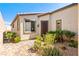 Well-maintained desert landscaping and a charming paver walkway welcomes you to this lovely home at 2612 Tullamore Creek Ln, Laughlin, NV 89029