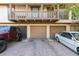 Charming townhome exterior with three garages, and second story balcony at 3189 Pinehurst Dr # B, Las Vegas, NV 89109