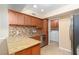 Well-lit kitchen featuring granite countertops, stainless steel appliances, and tiled backsplash at 3189 Pinehurst Dr # B, Las Vegas, NV 89109