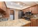 Kitchen featuring granite counters, stainless steel appliances, and modern finishes at 3189 Pinehurst Dr # B, Las Vegas, NV 89109