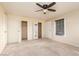 Inviting main bedroom with carpet, closets, fan, and lots of space at 3189 Pinehurst Dr # B, Las Vegas, NV 89109