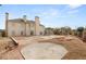 Expansive backyard featuring a brick patio and a covered pool area, perfect for outdoor gatherings and leisure at 3207 Bel Air Dr, Las Vegas, NV 89109