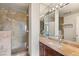 Modern bathroom featuring a glass-enclosed shower, sleek vanity, and contemporary fixtures for a luxurious feel at 3207 Bel Air Dr, Las Vegas, NV 89109