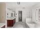 Stylish bathroom with double vanities, soaking tub, and shower for optimal convenience at 3207 Bel Air Dr, Las Vegas, NV 89109