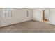 Spacious bedroom with ample natural light from shuttered windows and ensuite bathroom access at 3207 Bel Air Dr, Las Vegas, NV 89109