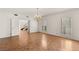 Bright living room featuring parquet floors and windows with white shutters at 3207 Bel Air Dr, Las Vegas, NV 89109