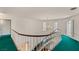 Bright staircase with white railings, chandelier, and shuttered windows offers classic elegance at 3207 Bel Air Dr, Las Vegas, NV 89109