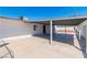 Attached carport area with a covered patio and painted support pillars at 3212 Hickey Ave, North Las Vegas, NV 89030