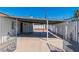 A gated view of the carport provides covered parking and access to the backyard at 3212 Hickey Ave, North Las Vegas, NV 89030
