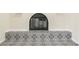Close up on a fireplace with black and white tile at 3212 Hickey Ave, North Las Vegas, NV 89030