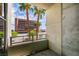 Balcony featuring palm tree views, and industrial metal railings at 353 E Bonneville Ave # 289, Las Vegas, NV 89101