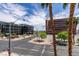 Open city view from balcony overlooking tree-lined street and modern office buildings at 353 E Bonneville Ave # 289, Las Vegas, NV 89101