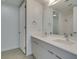 Bathroom featuring double sinks, modern fixtures, and neutral paint at 353 E Bonneville Ave # 289, Las Vegas, NV 89101