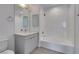Clean bathroom features a shower-tub combo and modern vanity at 353 E Bonneville Ave # 289, Las Vegas, NV 89101