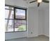 Bright bedroom with large window and ceiling fan at 353 E Bonneville Ave # 289, Las Vegas, NV 89101