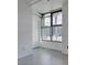 Bright room with large window offering city views and tile flooring at 353 E Bonneville Ave # 289, Las Vegas, NV 89101