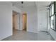Spacious bedroom featuring multiple closets, neutral paint and tile flooring at 353 E Bonneville Ave # 289, Las Vegas, NV 89101