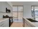 Bright kitchen features modern cabinets and stainless appliances at 353 E Bonneville Ave # 289, Las Vegas, NV 89101