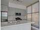 Modern kitchen featuring stainless steel appliances, white cabinets, and island at 353 E Bonneville Ave # 289, Las Vegas, NV 89101