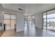 Open living area with tile floors, city views from expansive windows, and stainless steel appliances at 353 E Bonneville Ave # 289, Las Vegas, NV 89101