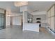 Modern living area with kitchen, bar-style countertop and ample sunlight from window at 353 E Bonneville Ave # 289, Las Vegas, NV 89101