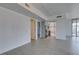 Bright living area with gray tile floors, stainless steel appliances, and abundant natural light at 353 E Bonneville Ave # 289, Las Vegas, NV 89101