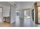 Bright living area with city views from expansive windows and stainless steel kitchen at 353 E Bonneville Ave # 289, Las Vegas, NV 89101