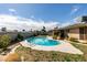 Backyard features a refreshing in-ground pool with ample space for entertaining at 4476 Oakhill Cir, Las Vegas, NV 89121