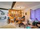 View of the dining room, featuring hardwood floors, a built in hutch and an ornate chandelier at 4476 Oakhill Cir, Las Vegas, NV 89121