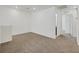 Carpeted bedroom with white walls and trim, and an ensuite bathroom at 4561 Woolcomber St, Las Vegas, NV 89115