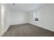 Empty bedroom with a window providing natural light and closet at 4561 Woolcomber St, Las Vegas, NV 89115