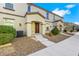 Traditional-style home featuring a covered entryway, symmetrical windows, and low-maintenance landscaping at 4561 Woolcomber St, Las Vegas, NV 89115