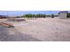 Vast backyard featuring minimal landscaping, offering a blank canvas for customization and outdoor activities at 4830 E Comanche Dr, Pahrump, NV 89061
